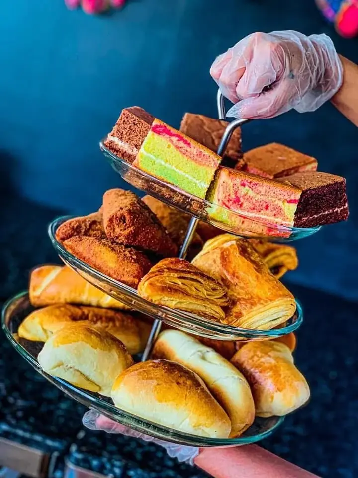 A tiered selection of WellOn cakes, pastries and buns